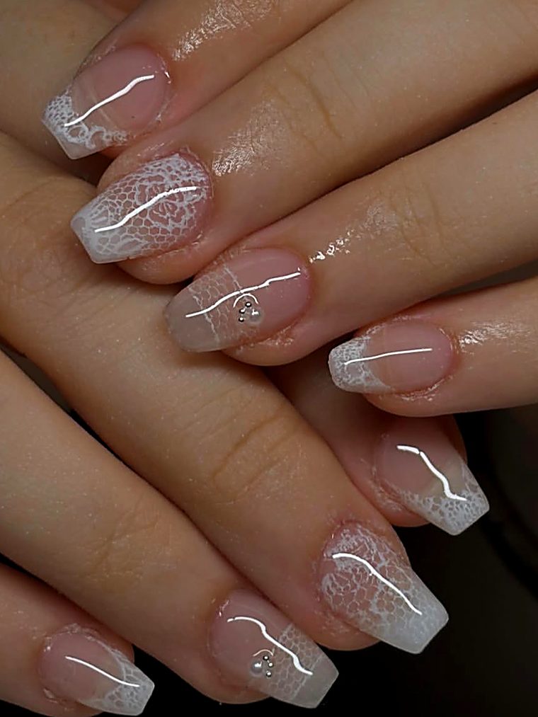 Nude nails with white tips and dark red 3D flowers