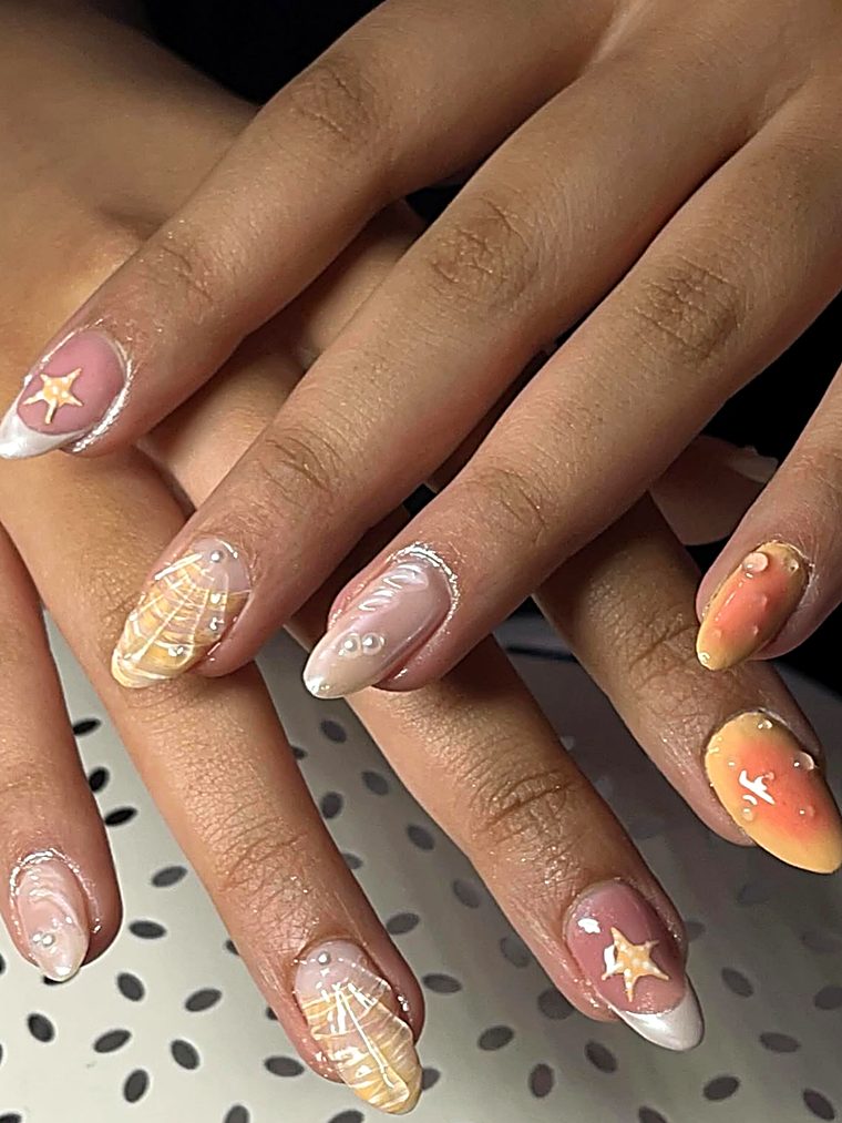 Pearly nails with starfish, shells and a peach sunset tip