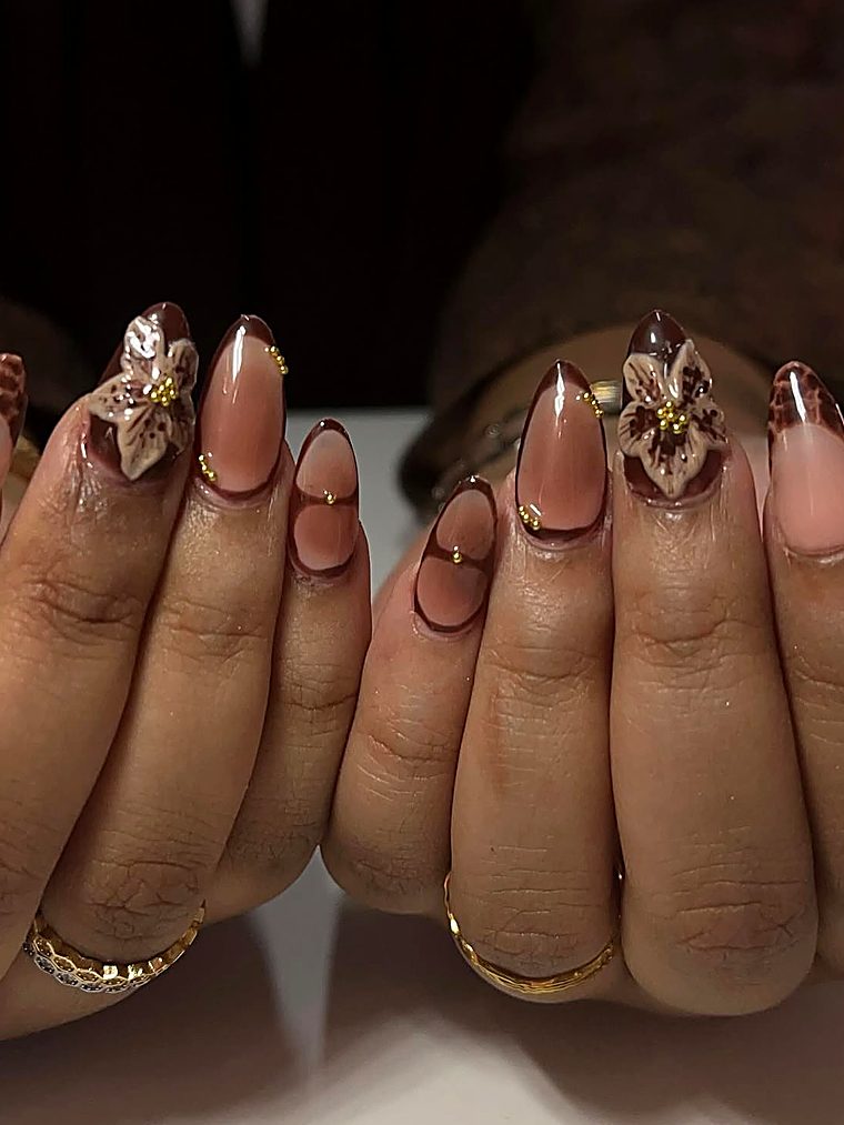 Chocolate French tips with gold beads and a 3D lily